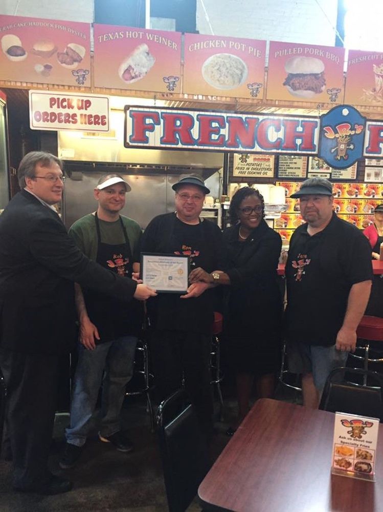 Ron's Group Photo.jpg Photo of Ron and the team with Mayor Bracey, receiving the Mayor’s Merchant of the Month award in 2016.
